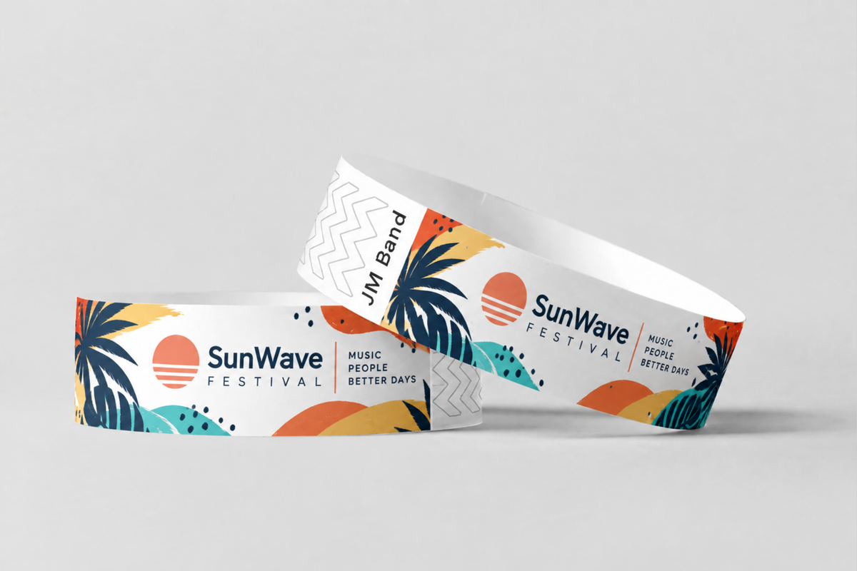 Twee papieren polsbandjes met full colour zonsondergang-festivalprint