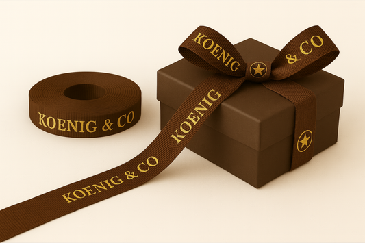 A photo of brown grosgrain gift ribbon with print